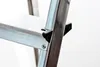 A close-up view of the steps and frame of a ladder. Náhľad obrázku produktu
