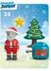 A Playmobil Junior Advent Calendar with Santa, a Christmas tree, and a gift box, set against a snowy background with numbered doors. Podgląd zdjęcia produktu