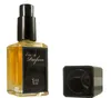 A perfume bottle and its cap are displayed against a white background. Produktbild-Vorschau
