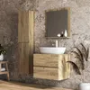 A modern bathroom vanity with a vessel sink and a tall cabinet, set against a textured stone wall. Náhled obrázku produktu