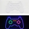 A split image showing a white outline of a gamepad neon sign on a white brick background and a lit neon gamepad sign with multiple colors on a black background. Produktbild-Vorschau