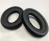Two black ear pads for headphones are shown on a white background. Anteprima dell’immagine prodotto
