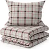 A stack of bedding with a plaid pattern. Náhľad obrázku produktu