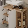 A bathroom vanity with a sink and storage cabinets. Náhled obrázku produktu