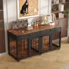 A dog crate furniture piece with two compartments and two drawers, displayed in a room setting with decor. Produktbild-Vorschau