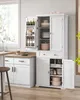 A white kitchen pantry cabinet with multiple shelves and doors, filled with kitchenware and food items, is shown in a kitchen setting. Náhled obrázku produktu