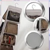 A hanging organizer with multiple compartments holding various handbags. Produktbild-Vorschau