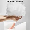 Hands holding a fluffy white material, with close-up insets showing texture and a finger pressing into a soft surface. Produktbild-Vorschau