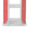 A close-up view of the bottom section of a white and pink bookshelf. Podgląd zdjęcia produktu