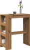 A bar table with shelves, a coffee cup, and a vase of flowers on top. Anteprima dell’immagine prodotto