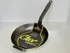 A De Buyer Choc Access frying pan with its packaging tag. Produktbild-Vorschau
