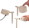 Collage showing different angles and uses of a beige LED lamp. Produktbild-Vorschau