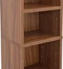 A close-up view of a wooden shelf unit. Voir les images du produit