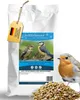 A bag of birdseed with a robin in the foreground and two blue tits on the bag's label. Produktbild-Vorschau
