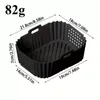 A black silicone air fryer liner with dimensions indicated by text and arrows. Produktbild-Vorschau
