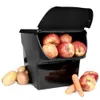 A black storage container filled with apples, with potatoes, onions, and carrots placed around it. Anteprima dell’immagine prodotto