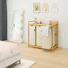 A bedroom scene with a laundry basket, mirror, and bed. Anteprima dell’immagine prodotto