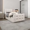 A bedroom scene with a bed, nightstand, and lamp. Produktbild-Vorschau