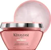 A pink jar of Kerastase hair mask with its lid slightly ajar. Produktbild-Vorschau