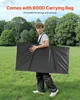 A man is carrying a large black bag in a grassy field with trees in the background. Náhled obrázku produktu