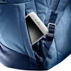 A close-up view of a smartphone placed in a pocket on a blue backpack. Produktbild-Vorschau