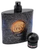 Parfumflasche Black Opium Eau de Parfum Intense von YSL mit glitzerndem Design, kupferfarbener Mitte und Kappe daneben. Náhled obrázku produktu
