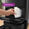 A hand is shown inserting a dust bag into a charging station for a robot vacuum cleaner. Anteprima dell’immagine prodotto