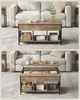 A living room scene showing a coffee table in two configurations: raised and lowered. Produktbild-Vorschau