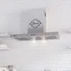 A stainless steel range hood mounted on a white brick wall above kitchen shelves. Produktbild-Vorschau