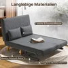 A dark gray sofa bed is shown in a room with a window in the background. Text overlays highlight product features. Voir les images du produit