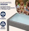 People enjoying a garden setting with a table. Produktbild-Vorschau