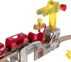 A close-up shot of a wooden toy train set with a crane loading cargo onto a train car. Podgląd zdjęcia produktu