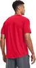 A man wearing a red t-shirt and grey shorts, shown from the back. Náhľad obrázku produktu