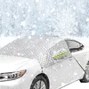 A white car is parked in a snowy environment, covered with a silver windshield cover. Produktbild-Vorschau