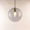 A clear, well-lit studio shot of a glass pendant light. Produktbild-Vorschau