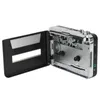 A portable cassette player with its lid open, revealing the internal mechanism. Voir les images du produit