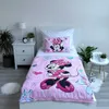 A child's bed with Minnie Mouse themed bedding. Podgląd zdjęcia produktu