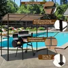 A grill pavilion and a barbecue grill are set up next to a swimming pool in a backyard. Podgląd zdjęcia produktu