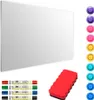 A white frameless magnetic whiteboard with markers, an eraser, and colorful magnets. Podgląd zdjęcia produktu
