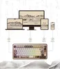 A diagram showing a mechanical keyboard connected to various devices like a laptop, PC monitor, tablet, and smartphone, illustrating its wireless and wired connectivity options. Produktbild-Vorschau