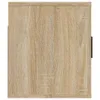 A close-up view of a wooden cabinet door with a visible handle on the right side. Voir les images du produit