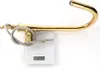 A gold kitchen faucet is placed on a digital scale. Produktbild-Vorschau