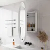 A modern bathroom with a sink, mirror, and medicine cabinet. Podgląd zdjęcia produktu