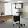 An office environment with a desk, chair, and a mobile computer stand with a monitor, keyboard, and computer tower. Náhled obrázku produktu