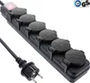 A black power strip with six covered outlets and a power cord, set against a white background. Produktbild-Vorschau