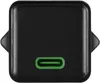 A close-up, top-down view of a black USB-C charger with a green USB-C port. Anteprima dell’immagine prodotto