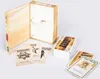 A wooden box for a card game is open, with cards spread out in front of it. Podgląd zdjęcia produktu