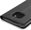 Close-up view of a black flip phone case for a Huawei Mate 20 Pro, showing the camera cutout. Náhľad obrázku produktu