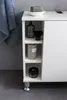 A white bathroom cabinet with shelves displaying toiletries. Náhled obrázku produktu