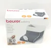 The image shows the packaging of a Beurer foot warmer. Produktbild-Vorschau